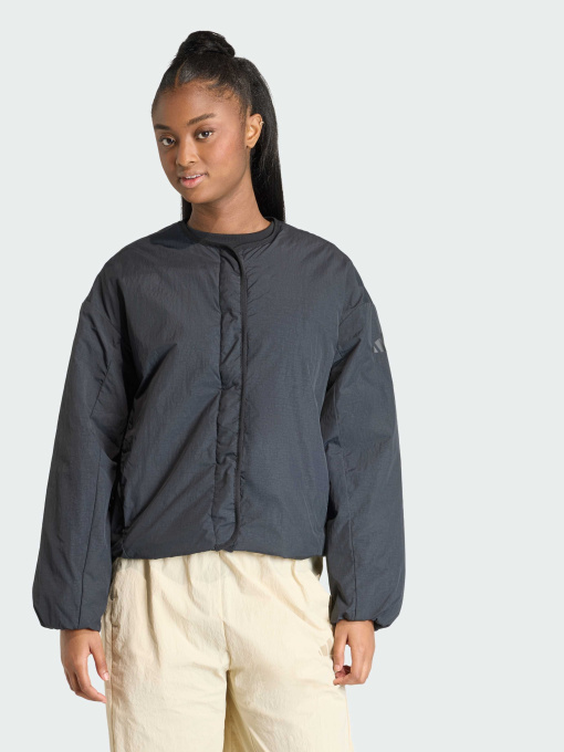 Куртки та дублянки Adidas модель KE6913 Фото